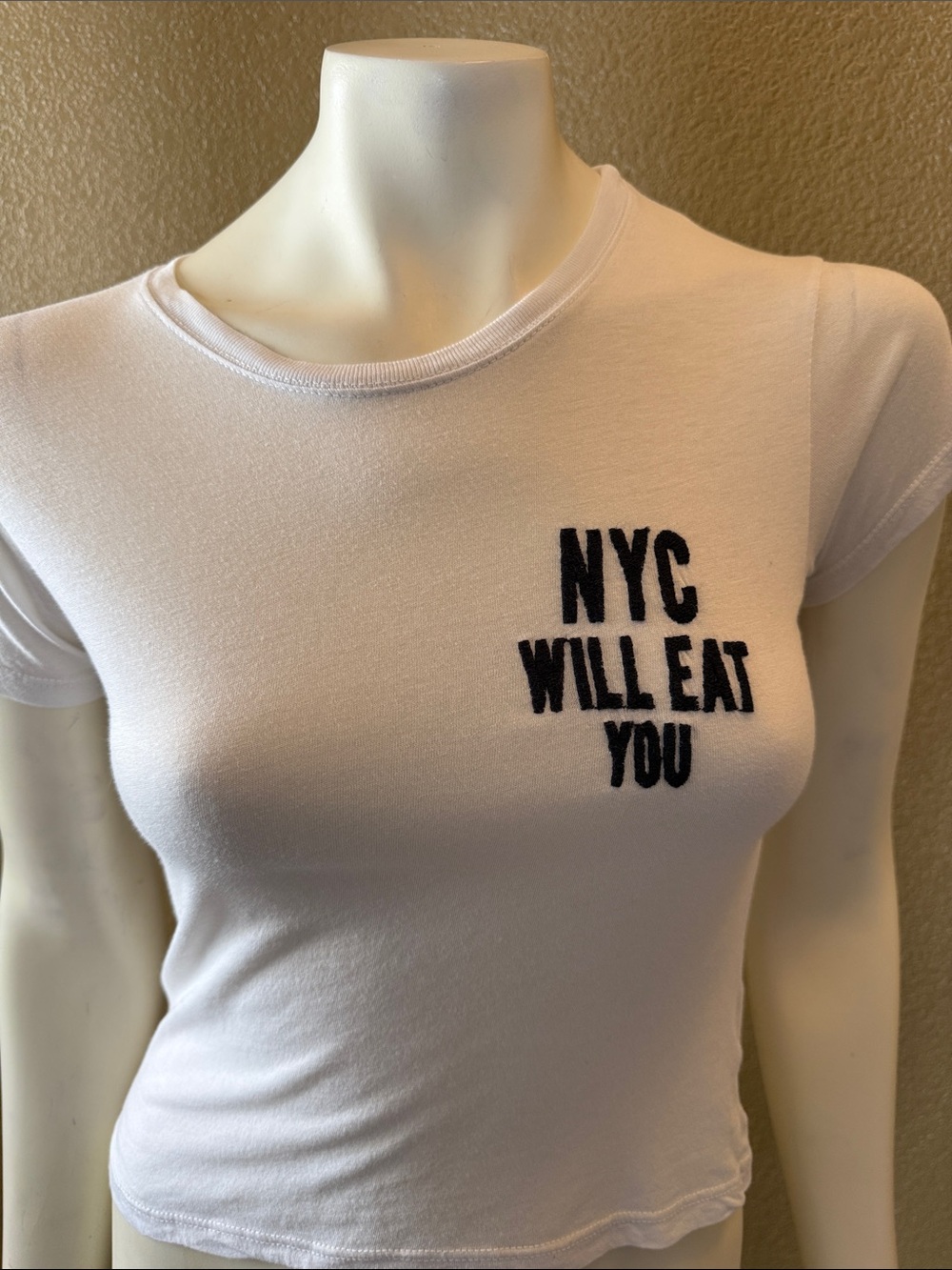 Brandy Melville White Crop Tee with Black 'NYC Will Eat You' Graphic
